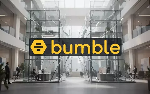 Abstrakte Darstellung einer Unternehmensübernahme durch ineinandergreifende moderne Glasarchitektur in einem Bürogebäude. - Foto: über boerse-global.de