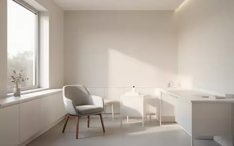 Ein heller, minimalistischer medizinischer Behandlungsraum in neutralem Design mit natürlichem Lichteinfall. - Foto: über boerse-global.de