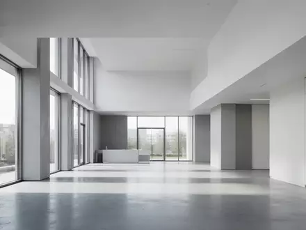 Modernes, minimalistisches Bürogebäude mit klaren architektonischen Linien und natürlichem Lichteinfall. - Foto: über boerse-global.de