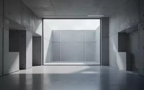 Ein minimalistischer, moderner Innenraum eines Forschungsgebäudes mit klaren architektonischen Linien und natürlichem Licht. - Foto: über boerse-global.de
