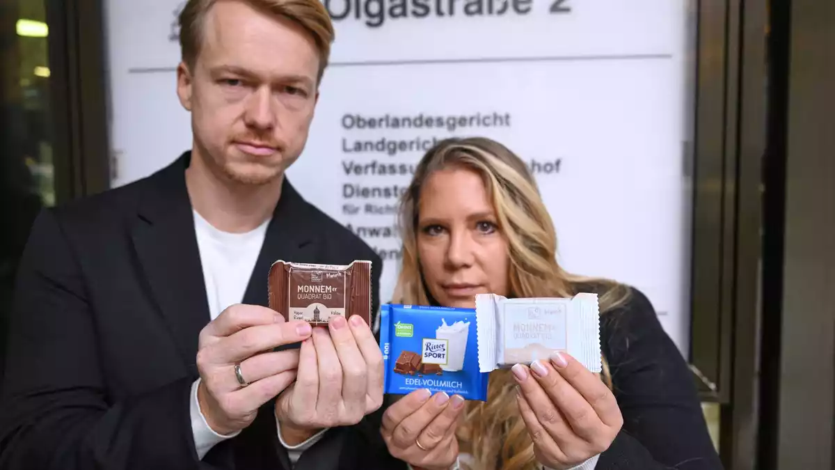 Ritter Sport hat die Wacker GmbH aus Mannheim verklagt, weil sie durch den quadratischen Haferriegel der Firma ihre Markenrechte verletzt sieht - die Geschäftsführer Matteo und Melanie Wacker wehren sich vor Gericht.  - Bild: Bernd Weißbrod/dpa