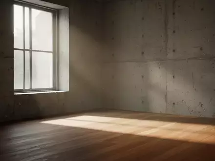 Ein minimalistischer, lichtdurchfluteter Raum mit sanften Schattenwürfen auf einer leeren Wand, der Ruhe und Zeitlichkeit vermittelt. - Foto: über boerse-global.de