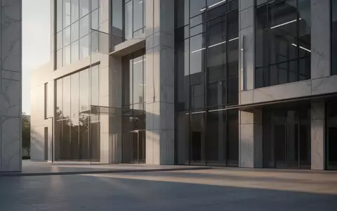 Ein modernes Bankgebäude aus Glas und Stein in der Morgensonne vor einem leeren Platz. - Foto: über boerse-global.de