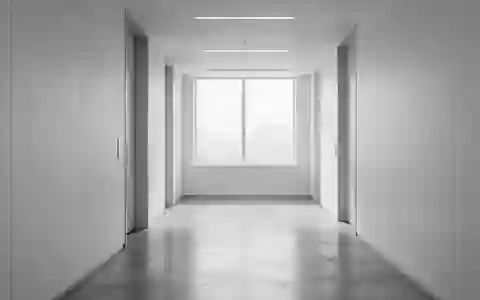 Ein heller, minimalistischer Flur in einer Behörde mit klaren architektonischen Linien und natürlichem Lichteinfall. - Foto: über boerse-global.de