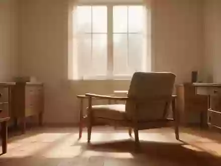 Ein lichtdurchfluteter, ruhiger Raum mit einem leeren Sessel vor einem Fenster, der eine Atmosphäre von Würde und Ruhe vermittelt. - Foto: über boerse-global.de