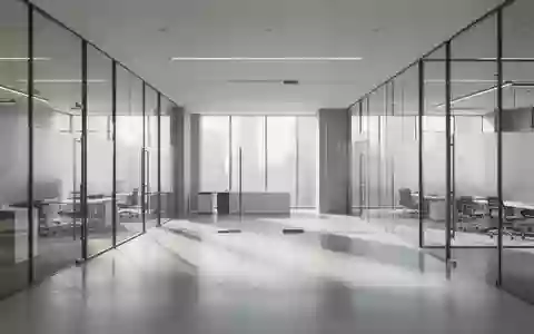 Modernes, minimalistisches Bürointerieur mit architektonischen Linien und natürlichem Lichteinfall. - Foto: über boerse-global.de