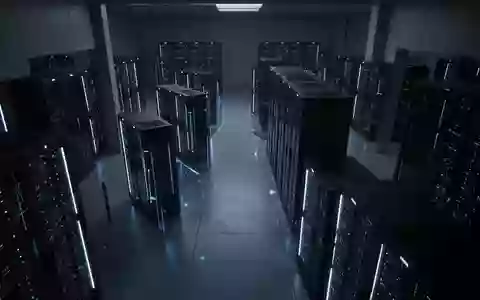 Ein dunkler, minimalistischer Serverraum mit blau beleuchteten Racks, der die komplexe digitale Infrastruktur symbolisiert. - Foto: über boerse-global.de