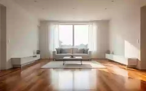 Ein minimalistisch eingerichteter, heller Wohnraum mit Holzboden in einer ruhigen, modernen Wohnumgebung. - Foto: über boerse-global.de