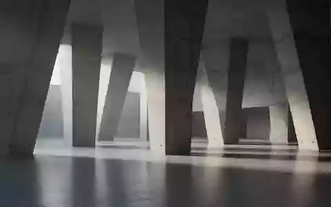 Minimalistische Architektur mit geometrischen Betonpfeilern und natürlichem Lichteinfall in einer ruhigen Halle. - Foto: über boerse-global.de