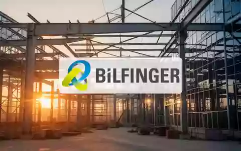 Moderne Baustelle bei Sonnenaufgang mit Stahlträgern und Glasarchitektur als Symbol für die industrielle Entwicklung. - Foto: über boerse-global.de