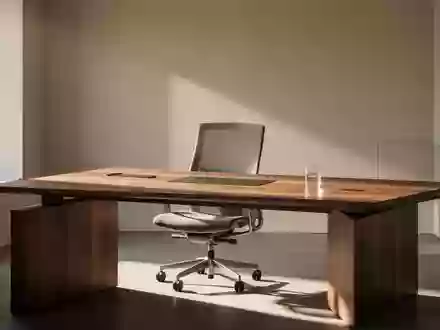 Ein minimalistischer Arbeitsplatz mit einem Holztisch und weichem Tageslicht in einem schlichten, modernen Interieur. - Foto: über boerse-global.de