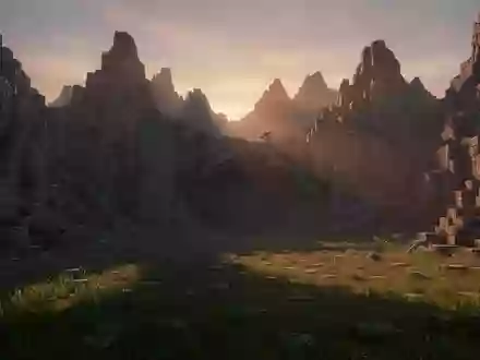 Eine weitläufige, blockartige Spiellandschaft mit zerklüfteten Bergen und einem dunklen Höhleneingang bei Sonnenuntergang. - Foto: über boerse-global.de