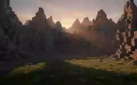 Eine weitläufige, blockartige Spiellandschaft mit zerklüfteten Bergen und einem dunklen Höhleneingang bei Sonnenuntergang. - Foto: über boerse-global.de
