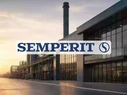 Abstrakte Darstellung einer modernen Industrieanlage bei Sonnenaufgang als Symbol für wirtschaftliches Wachstum. - Foto: über boerse-global.de