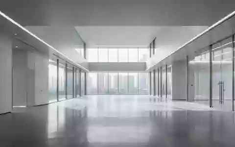 Ein minimalistisches, modernes Interieur eines Forschungszentrums mit poliertem Betonboden und hellem Tageslicht. - Foto: über boerse-global.de