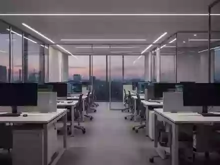 Ein minimalistisches, modernes Büro mit unbenutzten Arbeitsplätzen und indirekter Beleuchtung. - Foto: über boerse-global.de
