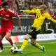 Intensive Zweikämpfe dominierten die erste Halbzeit zwischen Union Berlin und Borussia Dortmund.  - Bild: Julius Frick/dpa