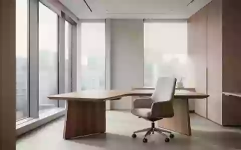Ein heller, minimalistisch eingerichteter moderner Arbeitsplatz mit einem leeren Schreibtisch und einem ergonomischen Stuhl. - Foto: über boerse-global.de
