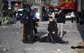 60 Polizisten wurden bei den Demonstrationen verletzt. - Foto: Emma Da Silva/AP/dpa