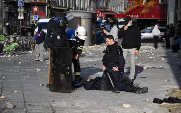 60 Polizisten wurden bei den Demonstrationen verletzt. - Foto: Emma Da Silva/AP/dpa