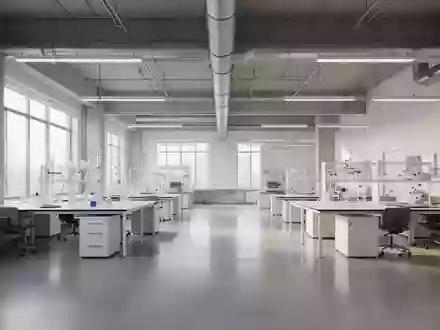 Ein minimalistisches, modernes Forschungslabor mit polierten Betonböden und hellem Tageslicht in einer weiten Innenansicht. - Foto: über boerse-global.de