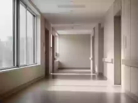 Ein heller, minimalistischer Krankenhausflur mit natürlichem Lichteinfall und klaren architektonischen Linien. - Foto: über boerse-global.de