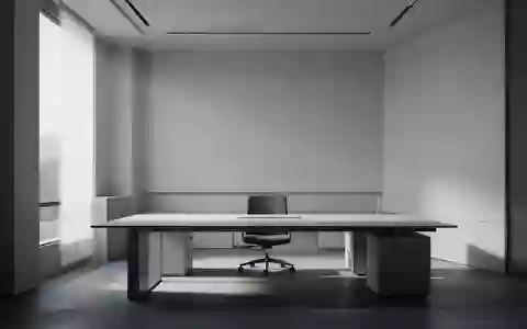 Ein minimalistisches, leeres Büro mit klaren architektonischen Linien und natürlichem Lichteinfall. - Foto: über boerse-global.de
