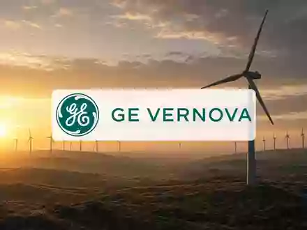 Moderne Windkraftanlagen in einer weiten Landschaft bei Sonnenuntergang als Symbol für Energiewirtschaft und Wachstum. - Foto: über boerse-global.de