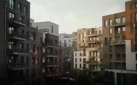 Moderne Wohnblocks in einem deutschen Stadtviertel bei Tageslicht. - Foto: über boerse-global.de
