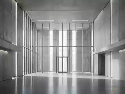 Modernes, minimalistisches Architekturinterieur eines europäischen Institutsgebäudes mit klaren Linien und natürlichem Licht. - Foto: über boerse-global.de