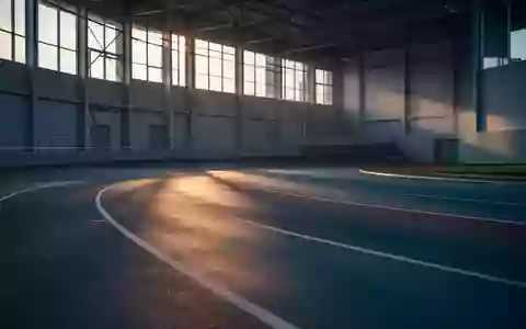 Eine leere, minimalistische Leichtathletikbahn in der Abenddämmerung mit weichem Licht und langen Schatten. - Foto: über boerse-global.de