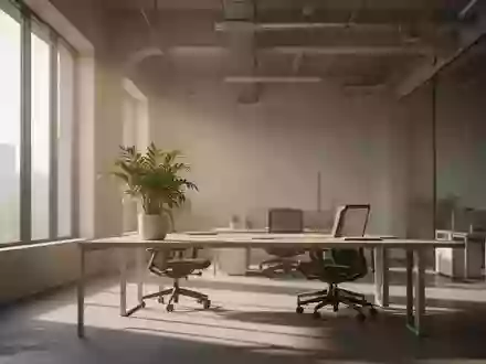 Ein leerer, modern gestalteter Arbeitsplatz mit natürlichem Lichteinfall und einer Zimmerpflanze in einem ruhigen Büro. - Foto: über boerse-global.de