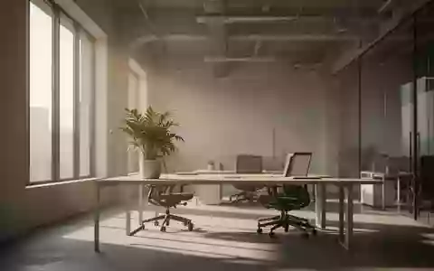 Ein leerer, modern gestalteter Arbeitsplatz mit natürlichem Lichteinfall und einer Zimmerpflanze in einem ruhigen Büro. - Foto: über boerse-global.de