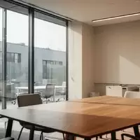 Ein minimalistisches, lichtdurchflutetes Büro mit neutralen Farben und moderner Architektur ohne Personen. - Foto: über boerse-global.de