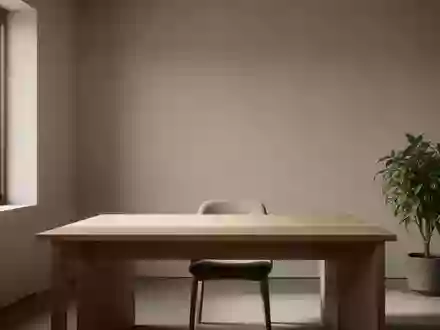 Ein minimalistischer, heller Arbeitsplatz mit einem leeren Holztisch und einer Pflanze in einem ruhigen, aufgeräumten Raum. - Foto: über boerse-global.de
