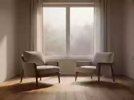 Ein minimalistisch eingerichteter, sonnendurchfluteter Raum mit einem Sessel vor einem Fenster. - Foto: über boerse-global.de
