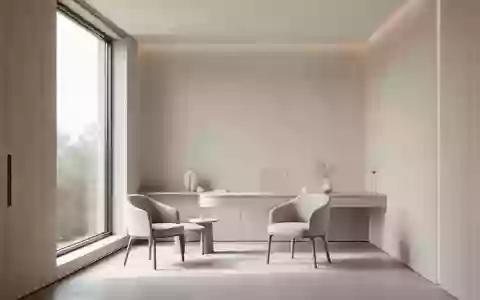 Ein minimalistischer, heller Behandlungsraum in einer modernen Klinik mit diffusem Tageslicht und neutraler Gestaltung. - Foto: über boerse-global.de