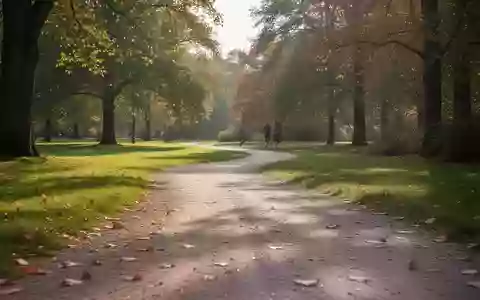 Ein von der Sonne beleuchteter Kiesweg in einem Park, der zu körperlicher Aktivität und Bewegung einlädt. - Foto: über boerse-global.de