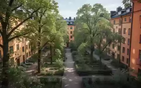 Ein urbanes Wohnviertel mit viel Vegetation und Bäumen zwischen den Häuserblöcken bei Tageslicht. - Foto: über boerse-global.de