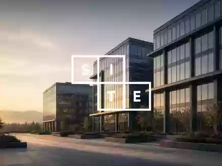Moderne Architektur eines gewerblichen Immobilienkomplexes bei hellem Tageslicht. - Foto: über boerse-global.de