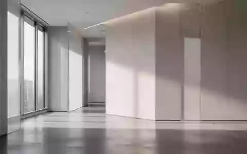 Modernes, minimalistisches Bürointerieur mit architektonischen Linien und natürlichem Lichteinfall. - Foto: über boerse-global.de