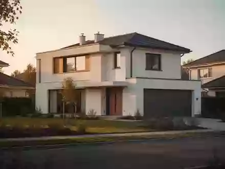 Ein Einfamilienhaus in einer ruhigen Wohngegend bei goldenem Licht. - Foto: über boerse-global.de