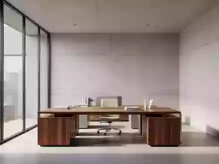 Ein minimalistisches, modernes Büro-Interieur mit klaren Linien, neutralen Farben und natürlichem Tageslicht ohne Personen. - Foto: über boerse-global.de