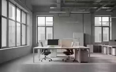 Ein heller, leerer Arbeitsbereich mit moderner Architektur und minimalistischer Ausstattung ohne Personen. - Foto: über boerse-global.de