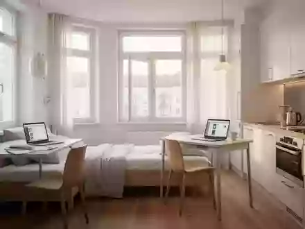 Modernes, helles Apartment für Auszubildende mit Schreibtisch und Kochnische in München. - Foto: über boerse-global.de