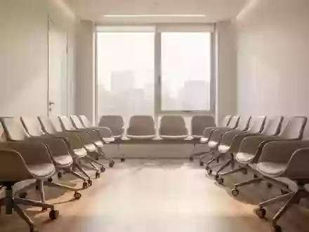 Ein moderner, leerer Wartebereich in einer Arztpraxis mit Tageslicht und minimalistischer Einrichtung. - Foto: über boerse-global.de