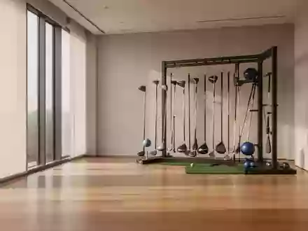 Ein minimalistischer, moderner Fitnessraum mit natürlichem Lichteinfall und Sportgeräten im Hintergrund. - Foto: über boerse-global.de