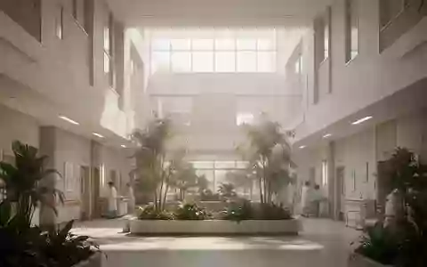 Ein helles, modernes Krankenhausatrium mit minimalistischer Architektur und Pflanzen, das eine beruhigende Atmosphäre ausstrahlt. - Foto: über boerse-global.de