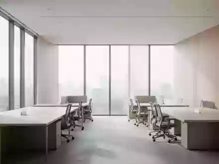 Ein minimalistischer, moderner Büroraum mit klaren Linien und hellem Tageslicht, ohne Personen oder Bildschirme. - Foto: über boerse-global.de