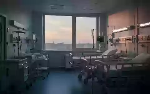 Ein ruhiges, steriles Intensivzimmer in einem Krankenhaus bei Dämmerlicht, fokussiert auf die Architektur des Raumes. - Foto: über boerse-global.de